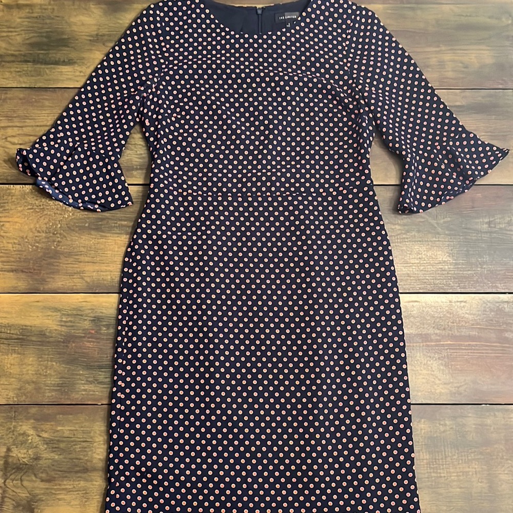 Navy background with tangerine polka dots!!